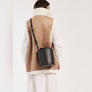 Matt & Nat bucket with camel tassels bag with adjustable strap